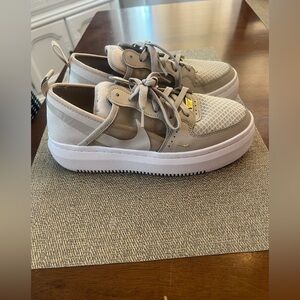 Nike Court Vision tennis shoes.